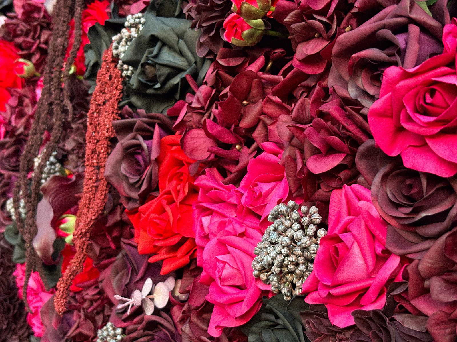 Close-up detail of the Midnight Bloom burgundy flower wall