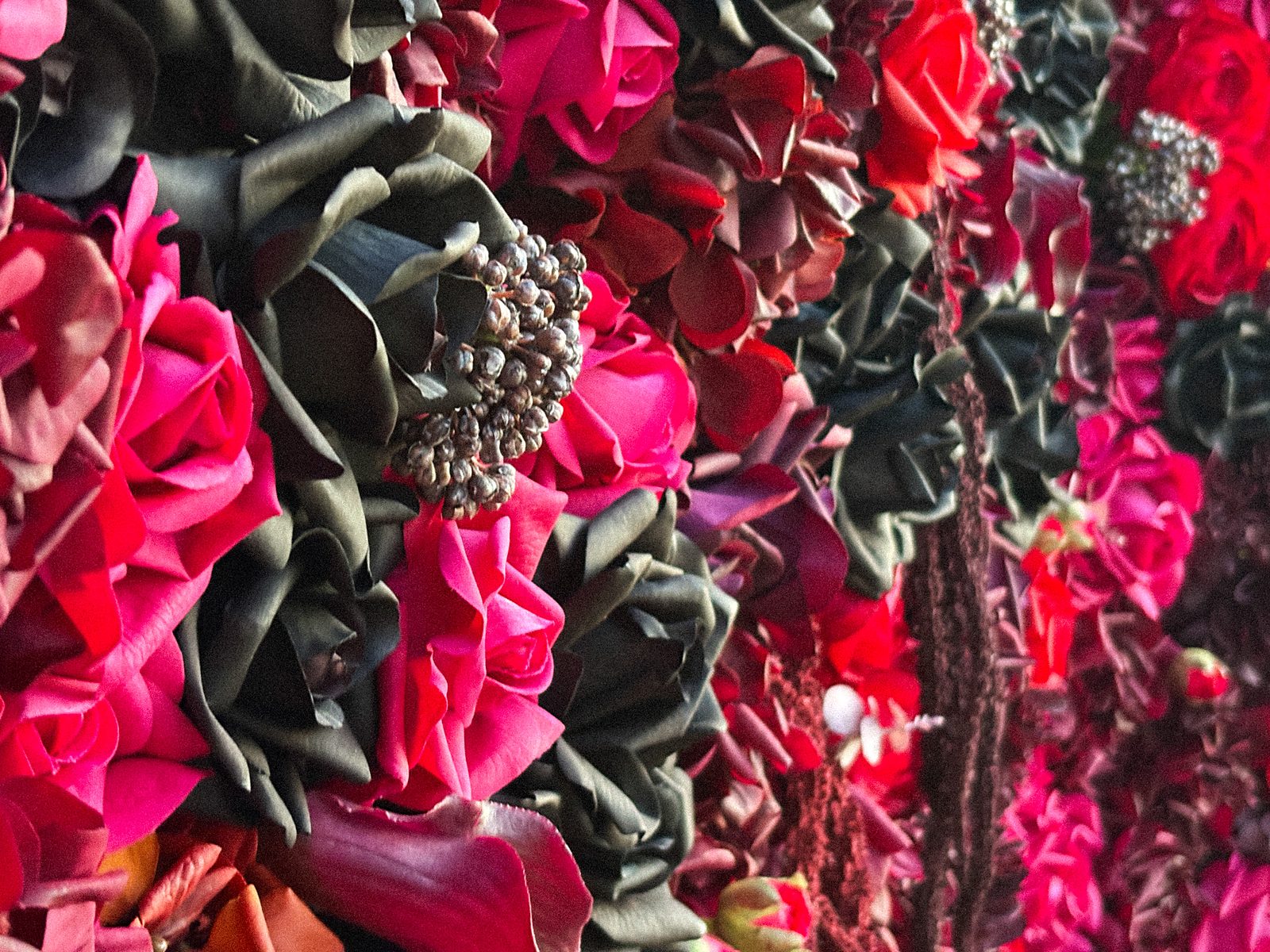 Detail view of the Midnight Bloom burgundy Real Touch flower wall