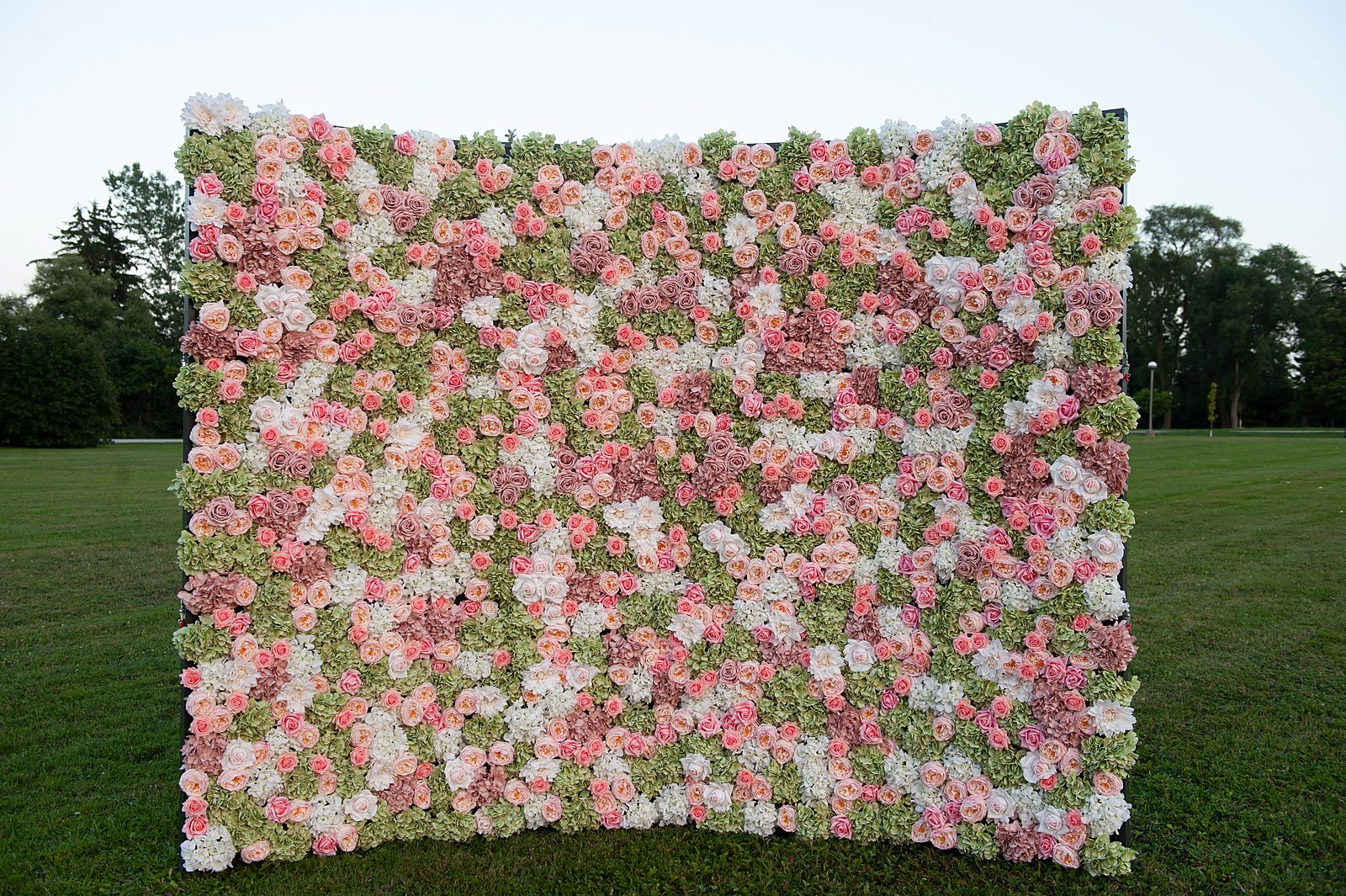 Green flower wall with sage hydrangea, eucalyptus and blush roses — Real Touch backdrop for garden weddings in Toronto & GTA